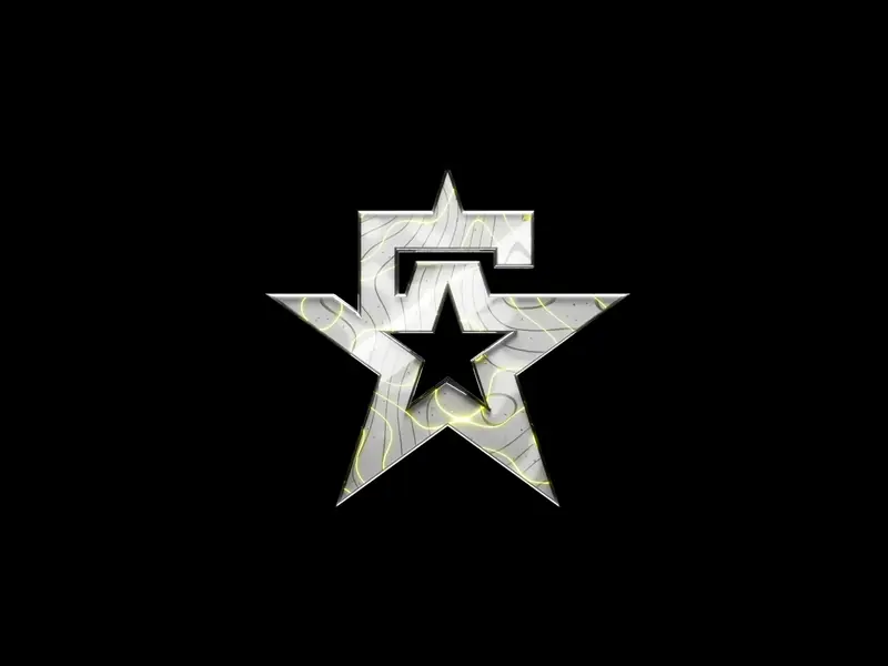 The 5 Star mark turning in the light: a chiselled metal star with a smaller star cut into its face
